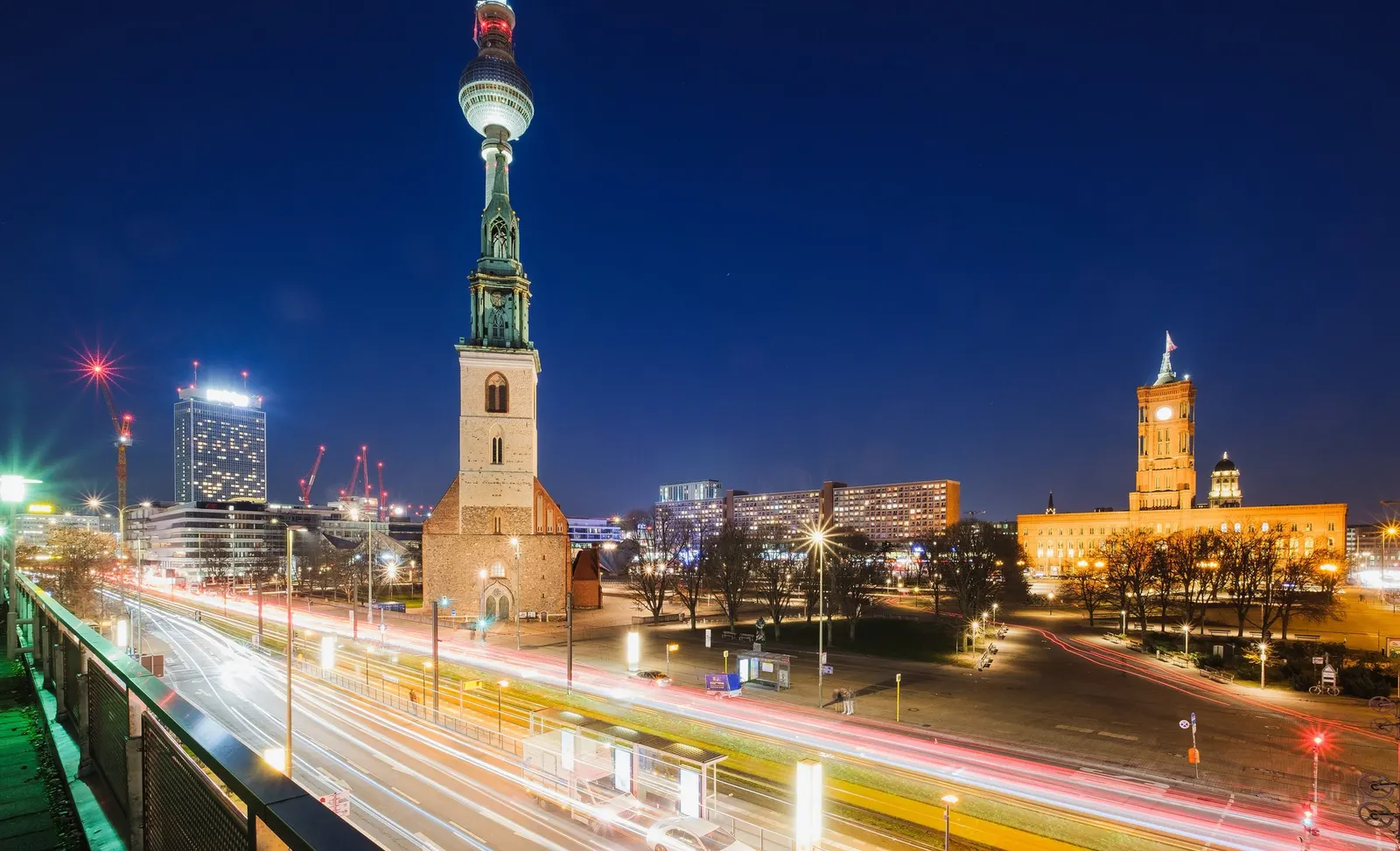Alexanderplatz in Berlin at night, with the television tower and the Red Town Hall (CC BY 2.0)